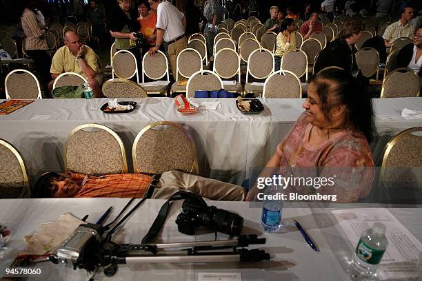 Samir Patel of Colleyville, Texas, lays down near his mother Jyoti following round 3 during the 2007 Scripps National Spelling Bee, Wednesday, May 30...