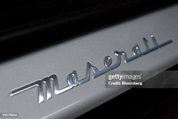 The Maserati logo is seen on a Maserati Quattroporte automobile in Modena, Italy, Tuesday, March 20, 2007. Look into the cockpit of a gorgeous,...