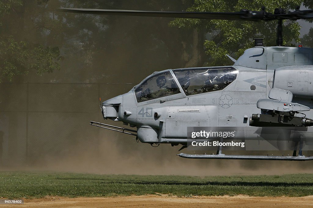 A AH-1W Cobra helicopter piloted by a member of the Marine L