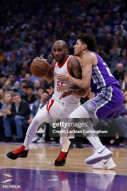 Aaron Jackson of the Houston Rockets drives past Justin Jackson of the Sacramento Kings at Golden 1 Center on April 11, 2018 in Sacramento,...