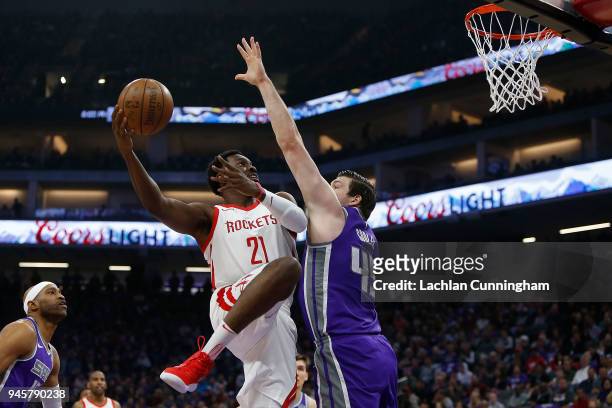 Chinanu Onuaku of the Houston Rockets shoots the ball against Jack Cooley of the Sacramento Kings at Golden 1 Center on April 11, 2018 in Sacramento,...