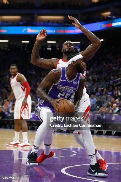 JaKarr Sampson of the Sacramento Kings is guarded by Tarik Black of the Houston Rockets at Golden 1 Center on April 11, 2018 in Sacramento,...