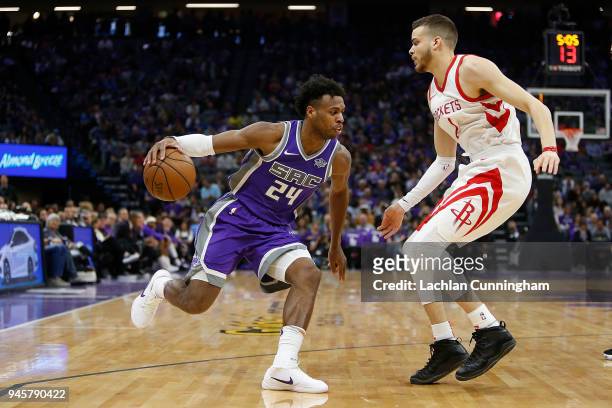 Buddy Hield of the Sacramento Kings is guarded by RJ Hunter of the Houston Rockets at Golden 1 Center on April 11, 2018 in Sacramento, California....