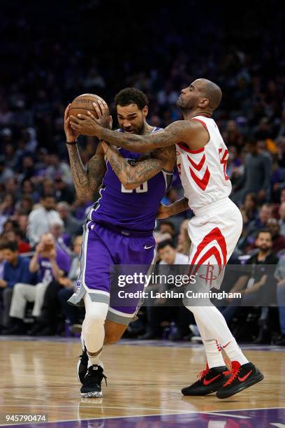 Willie Cauley-Stein of the Sacramento Kings is guarded by Aaron Jackson of the Houston Rockets at Golden 1 Center on April 11, 2018 in Sacramento,...