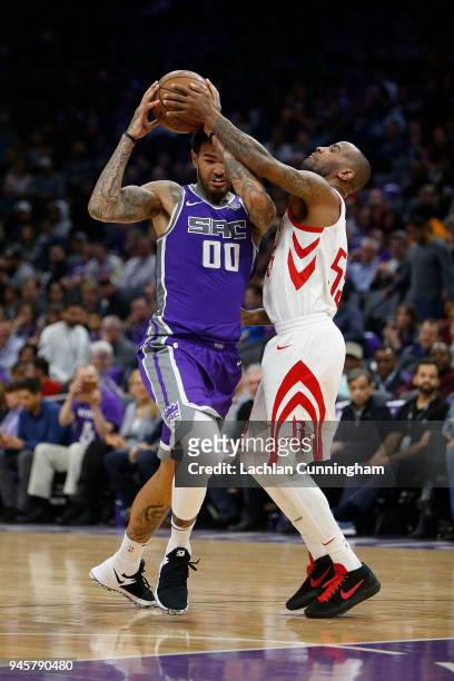Willie Cauley-Stein of the Sacramento Kings is guarded by Aaron Jackson of the Houston Rockets at Golden 1 Center on April 11, 2018 in Sacramento,...