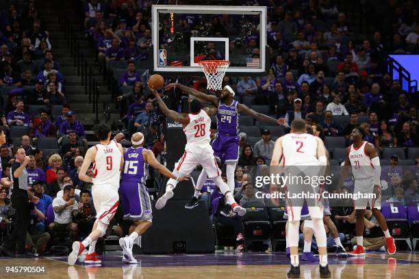 Tarik Black of the Houston Rockets shoots against JaKarr Sampson of the Sacramento Kings at Golden 1 Center on April 11, 2018 in Sacramento,...