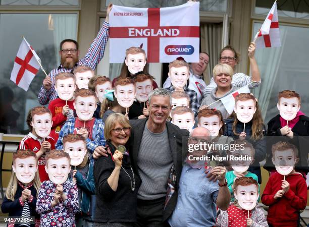 Jackie and David Laugher, parents of gold medal winning diver Jack Laugher pose with Mark Foster during a surprise party organised by npower on April...