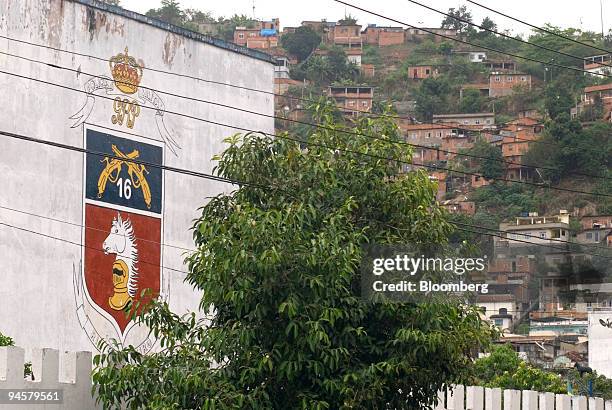 The 16th Military Police Batallion sits next to one of the Complexo do Alemao 17 favelas, in Rio de Janeiro, Brazil, on May 24, 2007.