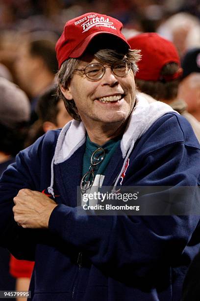 Author Stephen King supports the Boston Red Sox during the seventh game against the Cleveland Indians in the American League Championship Series in...