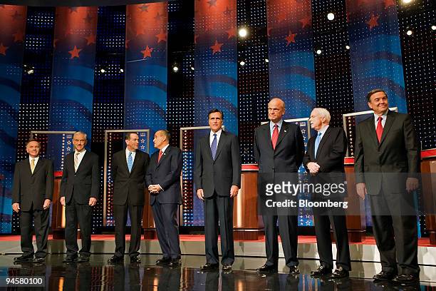 Republican presidential hopefuls assemble prior to a debate in Orlando, Florida, U.S., on Sunday, Oct. 22, 2007. From left to right are Tom Tancredo,...