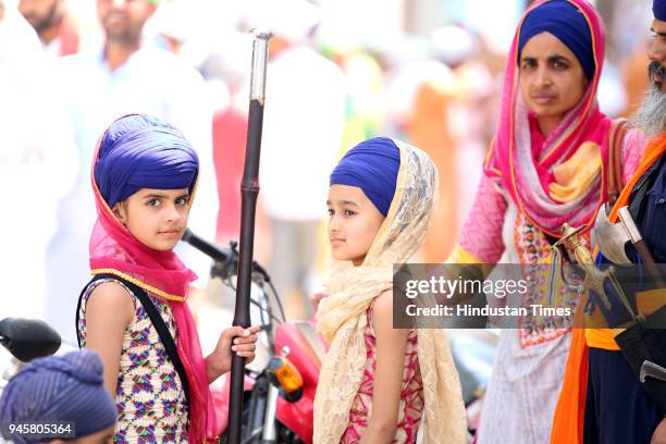 Sikh girls in traditional clothes on the occasion of Baisakhi at Takht Sri Damdama Sahib, on April 13, 2018 in Bathinda, India. Baisakhi, Vaishakhi,...