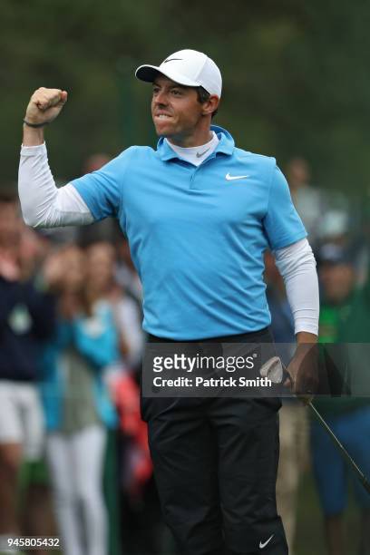 Rory McIlroy of Northern Ireland celebrates making eagle on the eighth hole during the third round of the 2018 Masters Tournament at Augusta National...