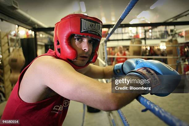 Jack Markham, an equities trader with Dresner Kleinwort in London, poses at the Cityboxer gym, Wednesday, November 17, 2006. ``White-collar boxing''...