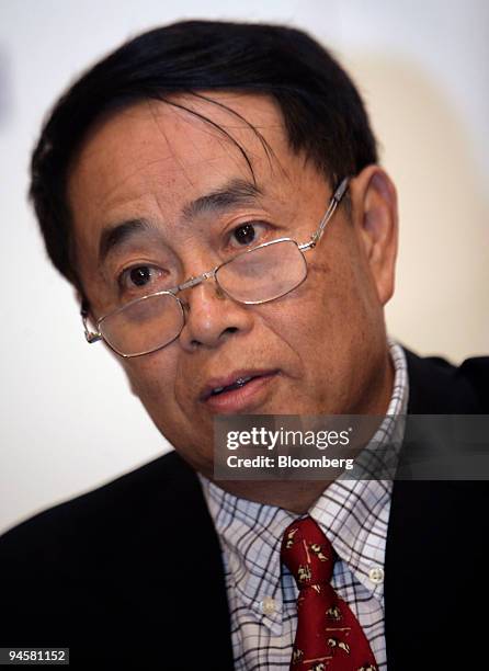 Zhou Shouwei, president and executive director of Cnooc. Ltd., attends a news conference after an annual general meeting in Hong Kong, China, on...
