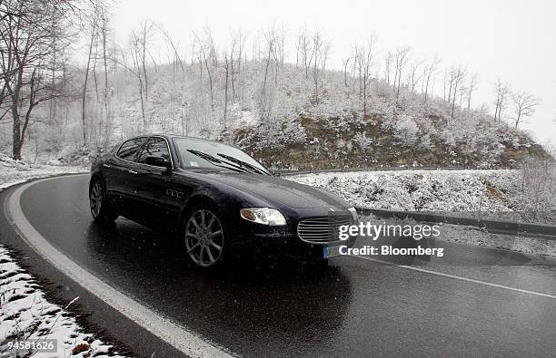 Maserati Quattroporte automobile is test driven near Guiglia, Italy, Tuesday, March 20, 2007. Look into the cockpit of a gorgeous, exotic car and --...