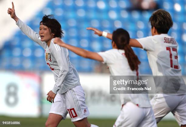 Mizuho Sakaguchi of Japan celebrates scoring the opening goal during the AFC Women's Asian Cup Group B match between Japan and Australia at the Amman...