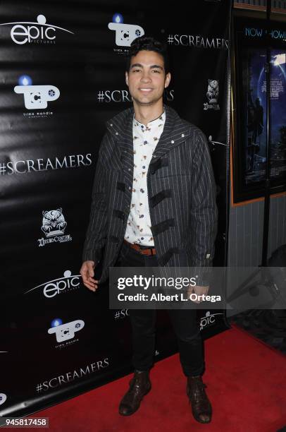 Davi Santos arrives for the Epic Pictures' "#Screamers" Los Angeles Premiere held at Los Feliz 3 Theatre on April 12, 2018 in Los Angeles, California.