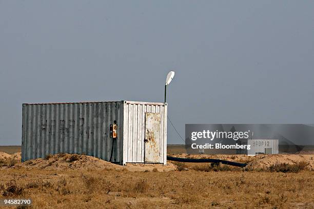 Collection sheds stand at the Eastern Mynkuduk uranium mine outside Kyzemshek, Kazakhstan, on Thursday, Oct. 18, 2007. Uranium is mined here using a...