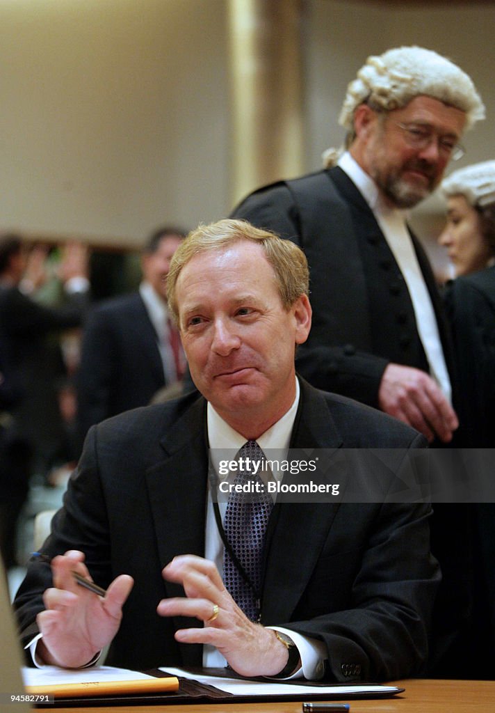 Brad Smith, Microsoft Corp general counsel reacts at a court hearing