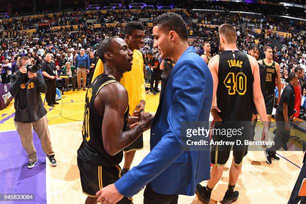 Kyle Kuzma of the Los Angeles Lakers greets Andre Ingram of the Los Angeles Lakers after the game against the Houston Rockets on April 10, 2017 at...