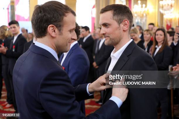 Simon Desthieux , French gold olympic medallist in mixed relay during the Pyeongchang 2018 Winter Olympic Games, is awarded Chevalier of the Legion...