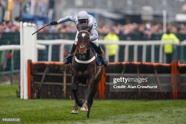 Nico de Boinville riding Santini clear the last to win The Doom Bar Sefton Novicesâ Hurdle Race at Aintree racecourse on April 13, 2018 in Liverpool,...