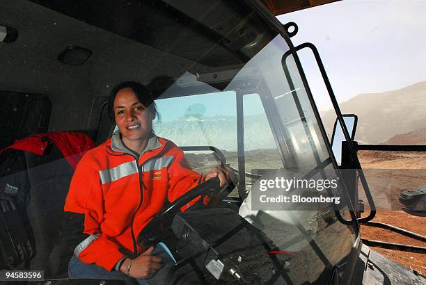 Patricia Guajardo sits in the mining truck she drives at Barrick Gold Corp.'s Veladero mine in the San Juan province of Argentina, on Tuesday, Oct....