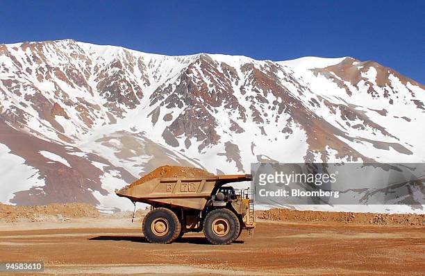 Patricia Guajardo drives a mining truck carrying gold and silver bearing ore at Barrick Gold Corp.'s Veladero mine in the San Juan province of...