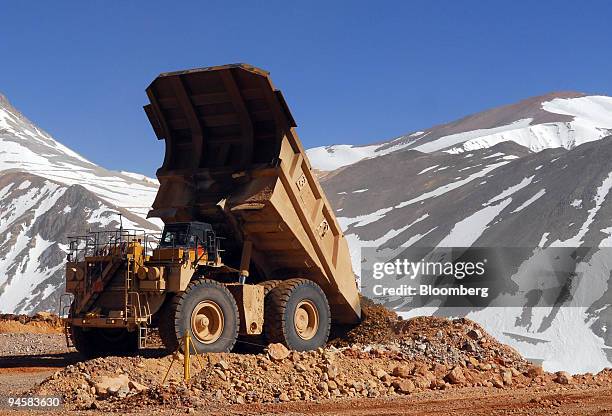 Patricia Guajardo drives a mining truck carrying gold and silver bearing ore at Barrick Gold Corp.'s Veladero mine in the San Juan province of...