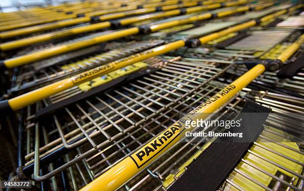 Shopping carts are stacked outside Foodstuffs NZ Ltd.'s Pak 'n Save supermarket, in Auckland, New Zealand, on Wednesday, May 23. 2007. Woolworths...