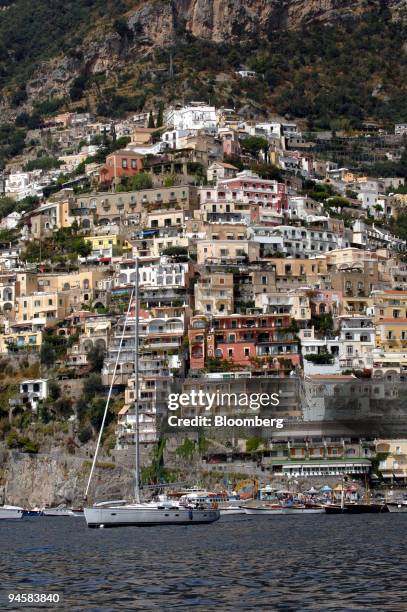 Boats sit in the bay in front of town of Positano along the on the Amalfi coast, Italy, on Friday, Sept. 14, 2007. The villas and hotels along the...