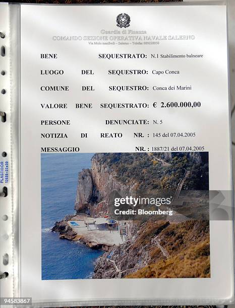 An photograph of a property, worth ?2.600.000, confiscated by the Guardia di Finanza on the Amalfi coast, is on display at a police station in...