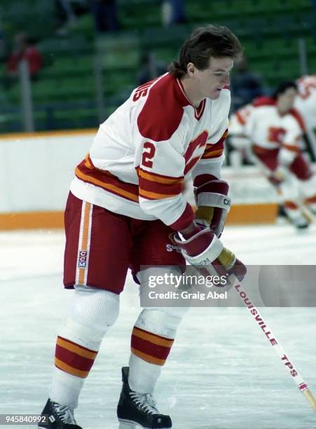 Al MacInnis of the Calgary Flames skates against the Toronto Maple Leafs during NHL game action on February 22, 1989 at the Olympic Saddledome in...