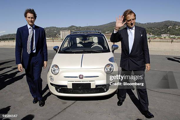 John Elkann, vice chairman of Fiat SpA, left, and Fiat SpA Chairman Luca Cordero di Montezemo, right, pose near the new Fiat 500 car in Turin, Italy,...
