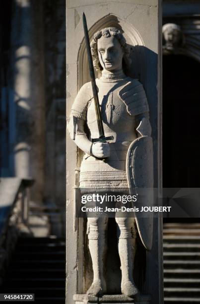 The stone column of Roland, by the Milanese sculptor Bonin in 1418. According to the legend, Roland helped to free the city besieged by the Arabian...