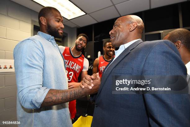 DeMarcus Cousins and General Manager Dell Demps of the New Orleans Pelicans shake hands after the game against the LA Clippers on April 9, 2018 at...