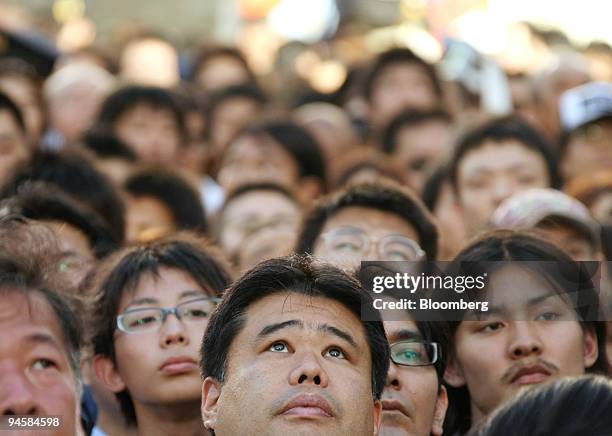 People gather to listen to speeches by Taro Aso, secretary general of the Liberal Democratic Party , and Yasuo Fukuda, former chief cabinet secretary...