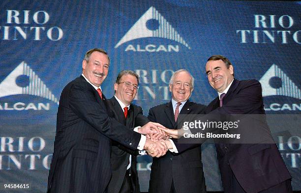 Richard Evans, chief executive officer of Alcan Inc., left, poses with, from left, Thomas Albanese, chief executive officer of Rio Tinto Group, Louis...