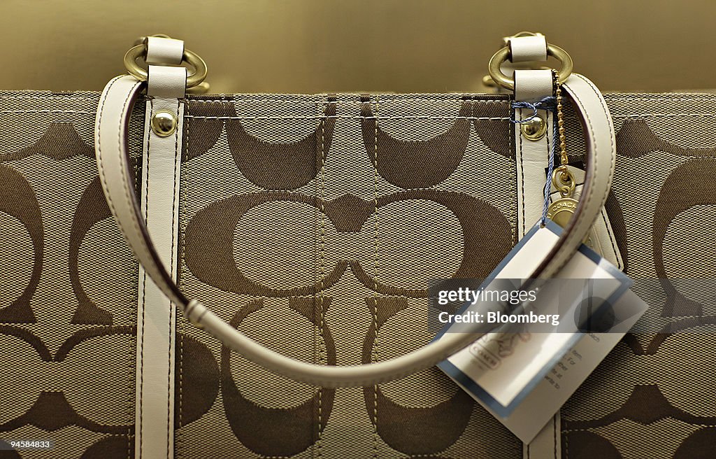 A Coach handbag sits on display in the Coach flagship store