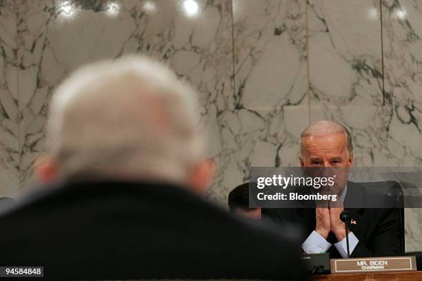 Senator Joseph Biden of Delaware listens to former Secretary of State Henry Kissinger testify at a Senate Foreign Relations Committee hearing on the...