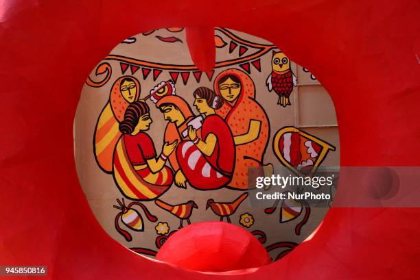 Student of Faculty of Fine arts of Dhaka University painting masks for colorful preparation to celebrate upcoming Bengali New Year 1425 in Dhaka,...