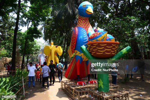 Student of Faculty of Fine arts of Dhaka University painting masks for colorful preparation to celebrate upcoming Bengali New Year 1425 in Dhaka,...