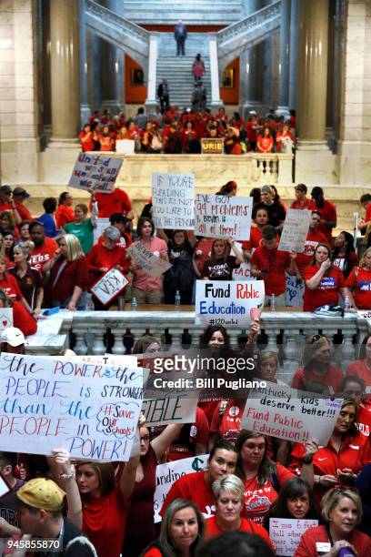 Kentucky Public school teachers protest outside the Kentucky House Chamber as they rally for a "day of action" at the Kentucky State Capitol to try...