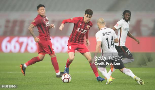 Javier Mascherano of Hebei China Fortune and Oscar of Shanghai SIPG in action during 2018 China Super League match between Shanghai SIPG and Hebei...