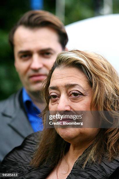 Zaha Hadid, foreground, and Patrik Schumacher pose at the Serpentine Gallery, London, U.K., Wednesday, July 11, 2007. Like a cluster of giant...