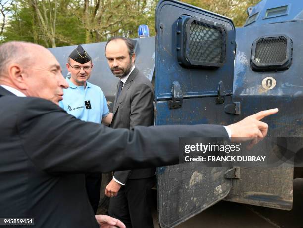 French Prime Minister Edouard Philippe and French Interior Minister Gerard Collomb visit on April 13, 2018 in Notre-Dame-des-Landes, the temporary...