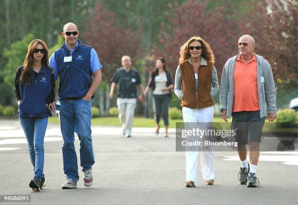 Barry Diller, chairman and chief executive officer of IAC/InterActiveCorp, right, along with his wife Diane von Furstenberg, chairman and founder of...