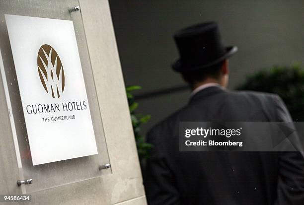 Doorman stands outside the Cumberland Hotel at London's Marble Arch, U.K., Monday, May 21, 2007. Vector Hospitality Plc, a U.K. Hotel owner, PIK...