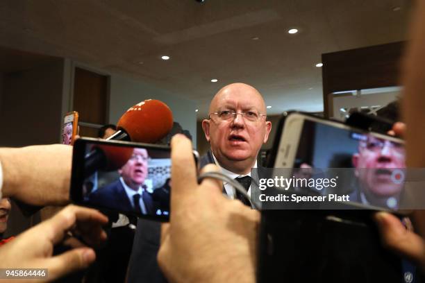 Russia's United Nations Ambassador Vassily Nebenzia speaks to the media after telling the U.N. Security Council in an emergency meeting that the...