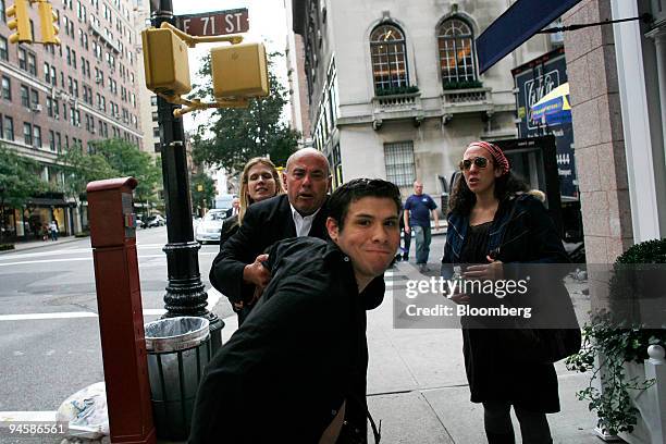 Lawrence Salander, second from the left, a New York art dealer, along with his wife Julie, left, attempts to restrain his son Jonah as he tries to...